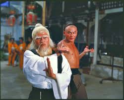 Kick his balls if you can find 'em